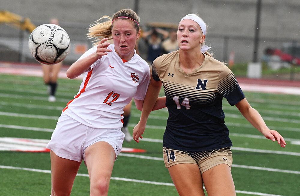 NFA's Marina Parodo competes with Bethlehem's Emma Zwicklbauer for possession